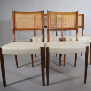 4 dining chairs in teak and rattan and seat in wool fabric. 1950's. 4 st matstolar i teak med rygg i rotting nyklädda. Wigerdal.