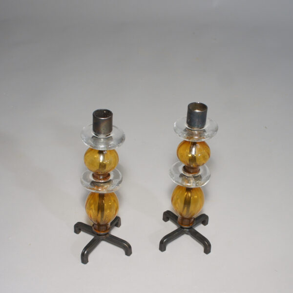 Erik Höglund for Kosta, Sweden. A pair of candle sticks in iron and glass. 1960's. Ljusstakar i glas och smide Wigerdals