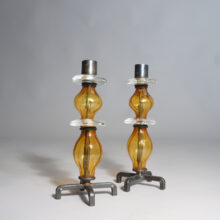 Erik Höglund for Kosta, Sweden. A pair of candle sticks in iron and glass. 1960's. Ljusstakar i glas och smide Wigerdals Värld