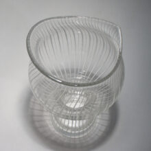 Tapio Wirkkala for Iittala. Hand blown cut clear glass vase internally decorated with spiral threads of black glass. Mod 3213 1947.