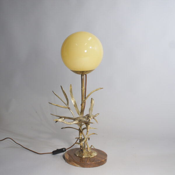 Desk lamp in brass, marbel and glass with bird sculpture.