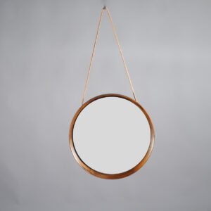 Östen & Uno Kristainsson for Luxus Sweden. Wall mirror in rosewood with leather strap. Väggspegel i jakaranda Wigerdals