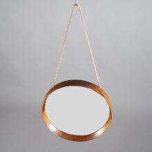 Östen & Uno Kristainsson for Luxus Sweden. Wall mirror in rosewood with leather strap. Väggspegel i jakaranda Wigerdals Värld