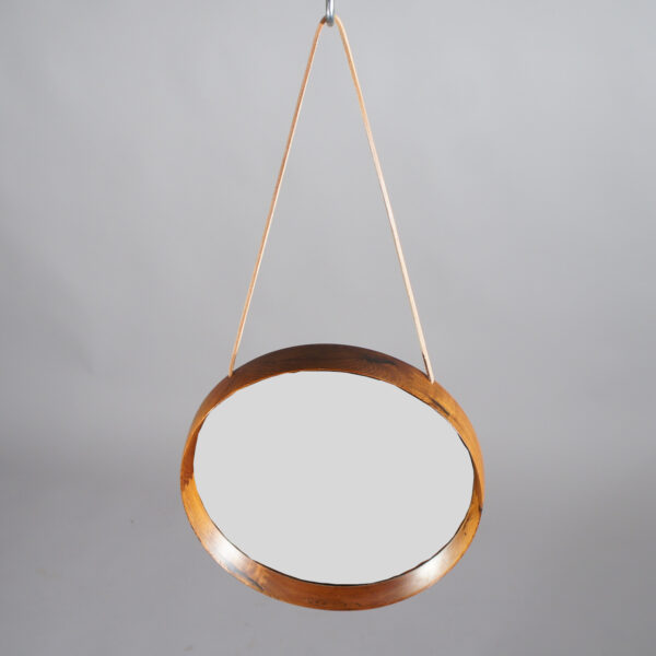 Östen & Uno Kristainsson for Luxus Sweden. Wall mirror in rosewood with leather strap. Väggspegel i jakaranda Wigerdals Värld