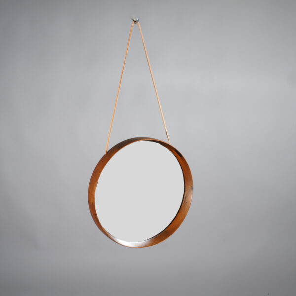 Östen & Uno Kristainsson for Luxus Sweden. Wall mirror in rosewood with leather strap. Väggspegel i jakaranda Wigerdals Värld