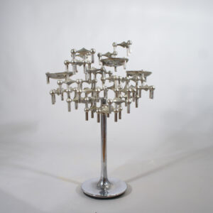 A tree of Nagel candle sticks in chrome steel. Ljusstakar i stål Wigerdals Värld