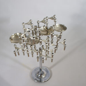 A tree of Nagel candle sticks in chrome steel. Ljusstakar i stål träd samling
