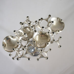 A tree of Nagel candle sticks in chrome steel. Wigerdals ljusstakar träd samling