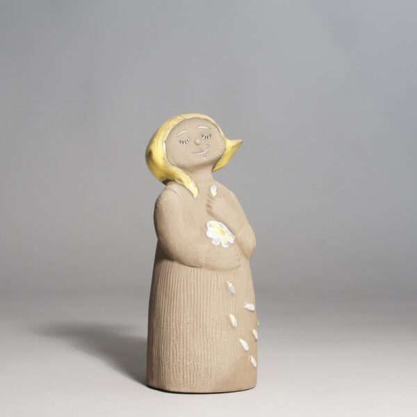 Mari Simmulsson for Upsala Ekeby. Figurine in ceramic. Girl with wind in her hair. Figurin Wigerdals