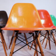 Charles and Ray Eames for Herman Miller USA. DSW. Six 6 side chairs in glass fiber in different colors with wood legs