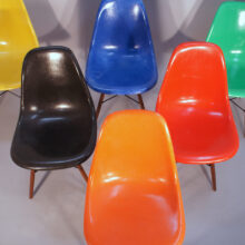 Charles and Ray Eames for Herman Miller USA. DSW. Six 6 side chairs in glass fiber in different colors with wood legs Wigerdals