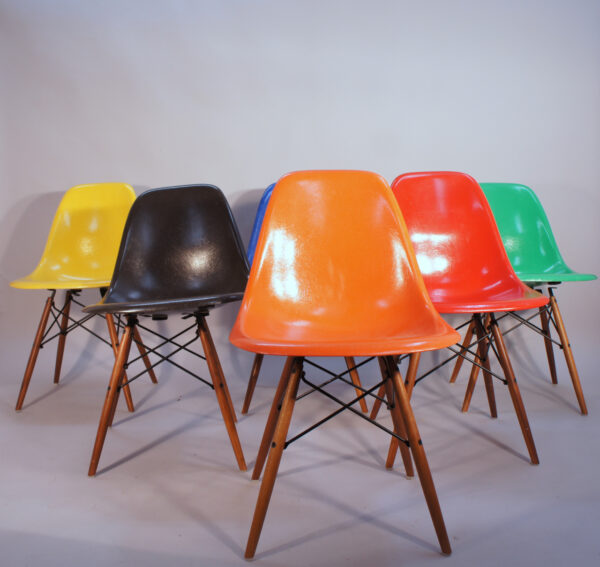 Charles and Ray Eames for Herman Miller USA. DSW. Six 6 side chairs in glass fiber in different colors with wood legs Glasfiber. Wigerdals