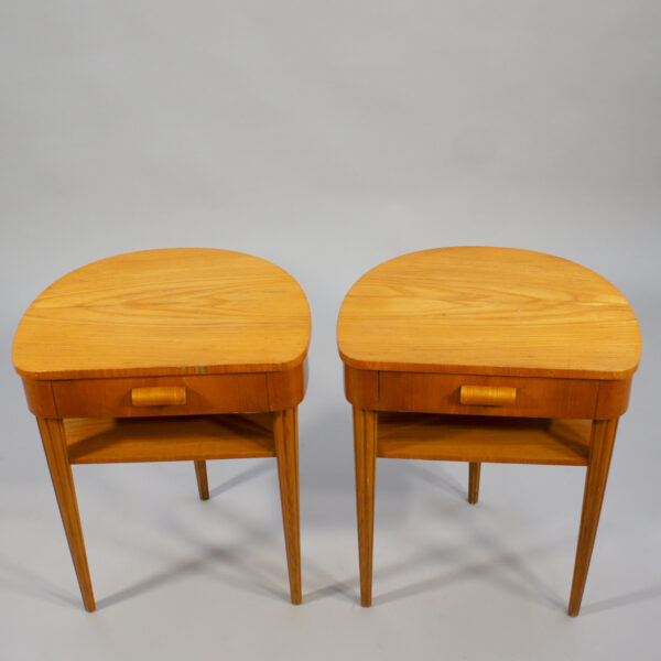 A pair of 1940's bed tables in birch.