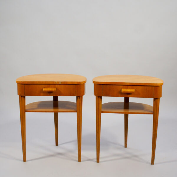 A pair of 1940's bed tables in birch.