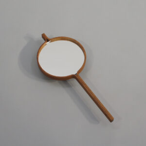 Hand mirror in teak by Hans-Agne Jakobsson. Handspegel i teak Wigerdals