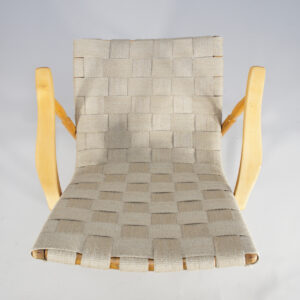 Yngve Ekström "Per" a pair of arm chairs in beech and webbing. Ett par karmstolar i bok och sadelgjord Wigerdal.com