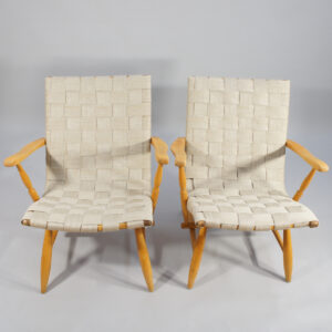 Yngve Ekström "Per" a pair of arm chairs in beech and webbing. Ett par karmstolar i bok och sakelgjord Wigerdal.com
