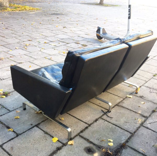 Christansen,Denmark. Pk31-2 2 sit sofa in black leather and legs in steel. Wigerdals