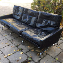 Poul Kjaerholm for E Kold Christansen,Denmark. Pk31-3 2 sit sofa in black leather and legs in steel. Wigerdal.com