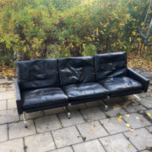 Poul Kjaerholm for E Kold Christansen,Denmark. Pk31-3 3 sit sofa in black leather and legs in steel.wigerdal.com