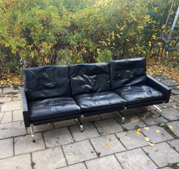 Poul Kjaerholm for E Kold Christansen,Denmark. Pk31-3 3 sit sofa in black leather and legs in steel.wigerdal.com