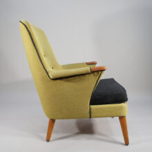 1950's new reupholstered danish easy chair with teak details.