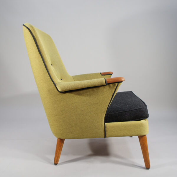 1950's new reupholstered danish easy chair with teak details.