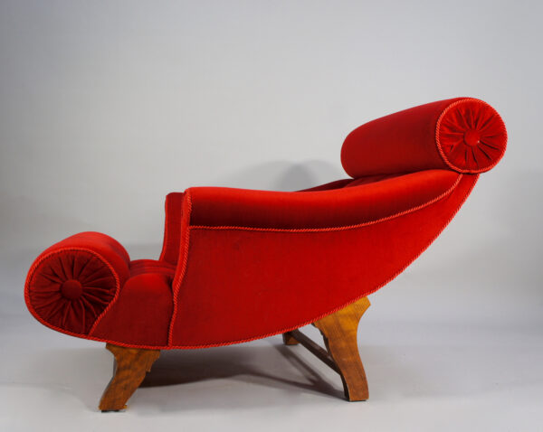 Adolf Loos. "Knieschwimmer" 1906. Easy chair in new production with velvet and legs in wood.