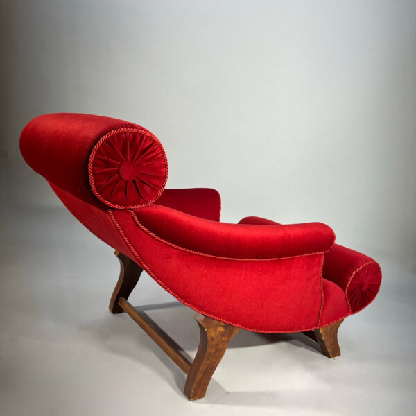 Adolf Loos. "Knieschwimmer" 1906. Easy chair in new production with velvet and legs in wood.