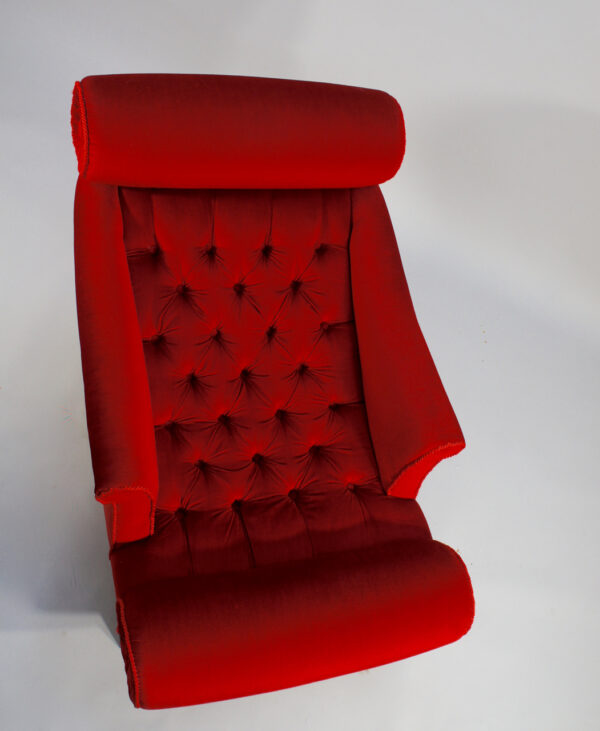 Adolf Loos. "Knieschwimmer" 1906. Easy chair in new production with velvet and legs in wood.