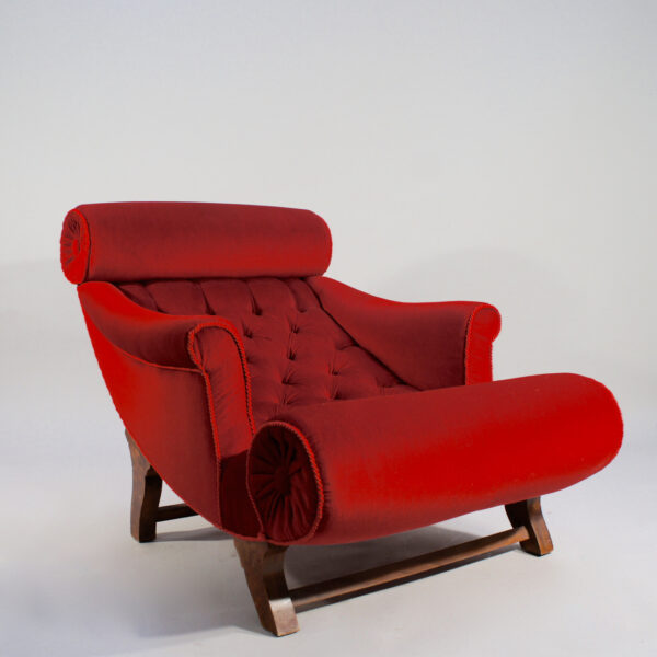 Adolf Loos. "Knieschwimmer" 1906. Easy chair in new production with velvet and legs in wood.