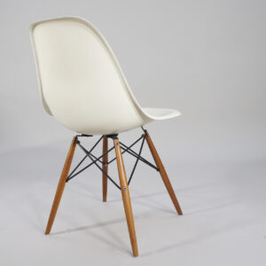 Ray & Charles Eames for Herman Miller. "DSW". 4 chairs in glass fibre with original wood legs.