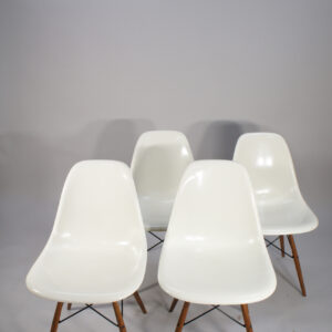 Ray & Charles Eames for Herman Miller. "DSW". 4 chairs in glass fibre with original wood legs.