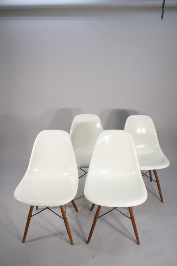 Ray & Charles Eames for Herman Miller. "DSW". 4 chairs in glass fibre with original wood legs.