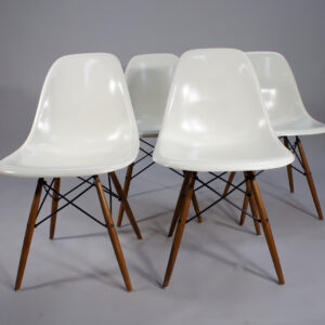 Ray & Charles Eames for Herman Miller. "DSW". 4 chairs in glass fibre with original wood legs.