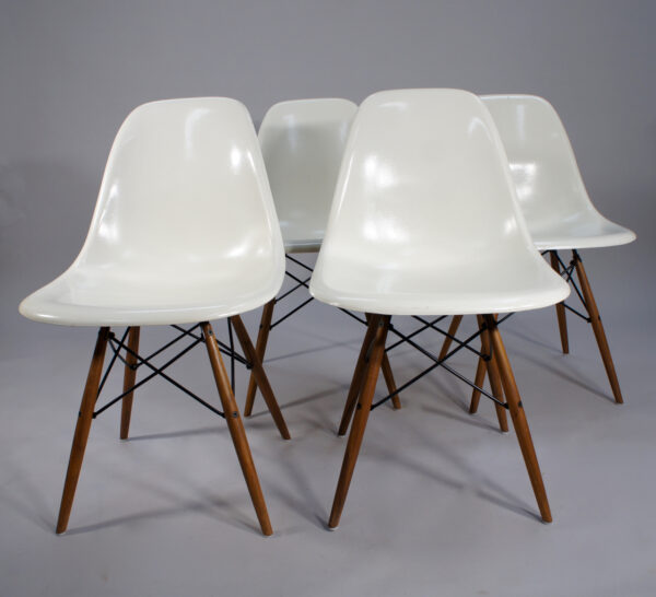 Ray & Charles Eames for Herman Miller. "DSW". 4 chairs in glass fibre with original wood legs.