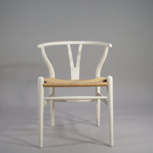 Hans J. Wegner for Carl Hansen, Denmark. "Wishbone chair" or "Y-chair". 8 chairs in painted beech and natural cord.