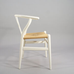 Hans J. Wegner for Carl Hansen, Denmark. "Wishbone chair" or "Y-chair". 8 chairs in painted beech and natural cord.