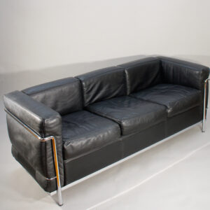 Le Courbusier for Cassina, Italy. LC2. A three seater sofa in black leather and chrome steel.