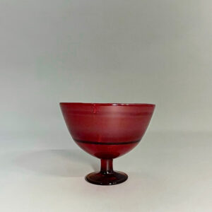 Erik Höglund for Kosta, Sweden. Signed bowl on foot in red glass