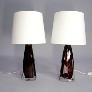 A pair of lamps in red glass by Carl Fagerlund for Orrefors, Sweden.