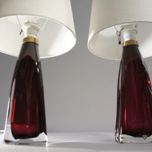 A pair of lamps in red glass by Carl Fagerlund for Orrefors, Sweden.