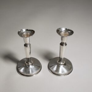 A pair of candle sticks in silver by Erik Löfman for MGAB, Sweden.