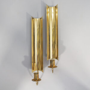 Pierre Forsell for Skultuna, Sweden. A pair of signed candle holders in brass.