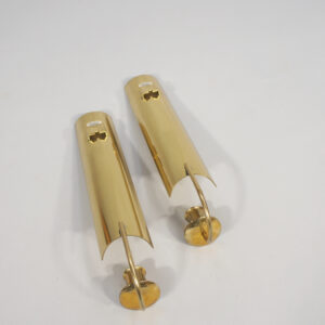 Pierre Forsell for Skultuna, Sweden. A pair of signed candle holders in brass.