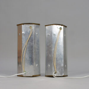 A pair of 1940-50's wall lamps in brass and glass.