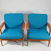 Bramin, Denmark. A pair of easy chairs in teak with new upholstering. Denmark
