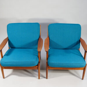 Bramin, Denmark. A pair of easy chairs in teak with new upholstering. Denmark