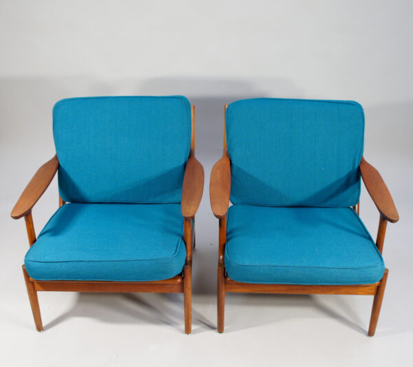 Bramin, Denmark. A pair of easy chairs in teak with new upholstering. Denmark