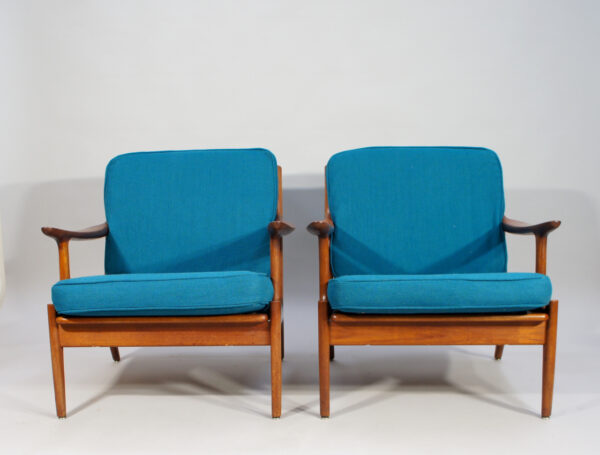 Bramin, Denmark. A pair of easy chairs in teak with new upholstering. Denmark